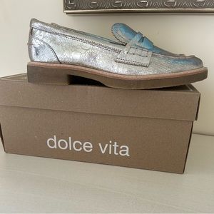 Leather silver loafers with soft rubber sole.